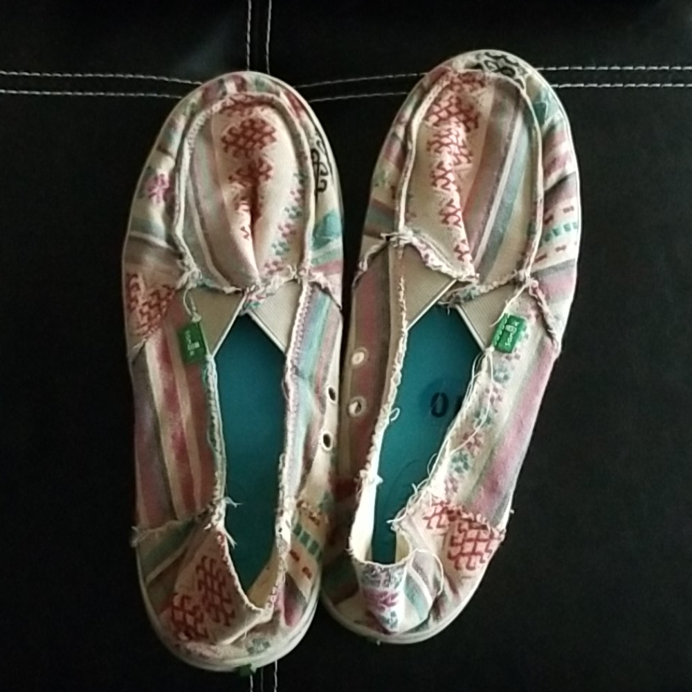 Sanuk slip ons